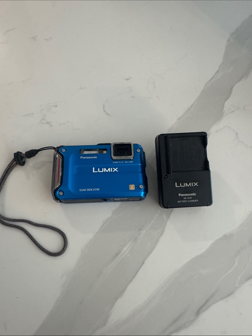 Panasonic Lumix Compact Digital Camera in Blue with Charger
